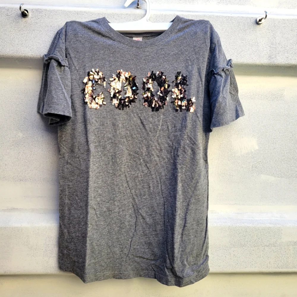 Justice oblong rectangle sequin wording top shirt with short bell ruffled sleeve